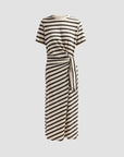 The slub stripe tee midi dress by Rag & Bone features short sleeves, a round neckline, and a knotted waist. Black and white stripes run horizontally on the top and diagonally on the skirt and tie. Shown against a plain gray background.