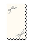 A cream-colored notecard with a scalloped black border and two black bow sketches—perfect for pairing with My Mind's Eye Guest/Dinner Napkin at your next gathering.