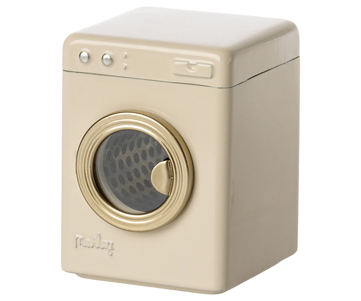The Maileg Furniture by Maileg is a small, beige toy washing machine with a round gold front door and simple top buttons—perfect as dollhouse furniture or to add charm to any cute collection.