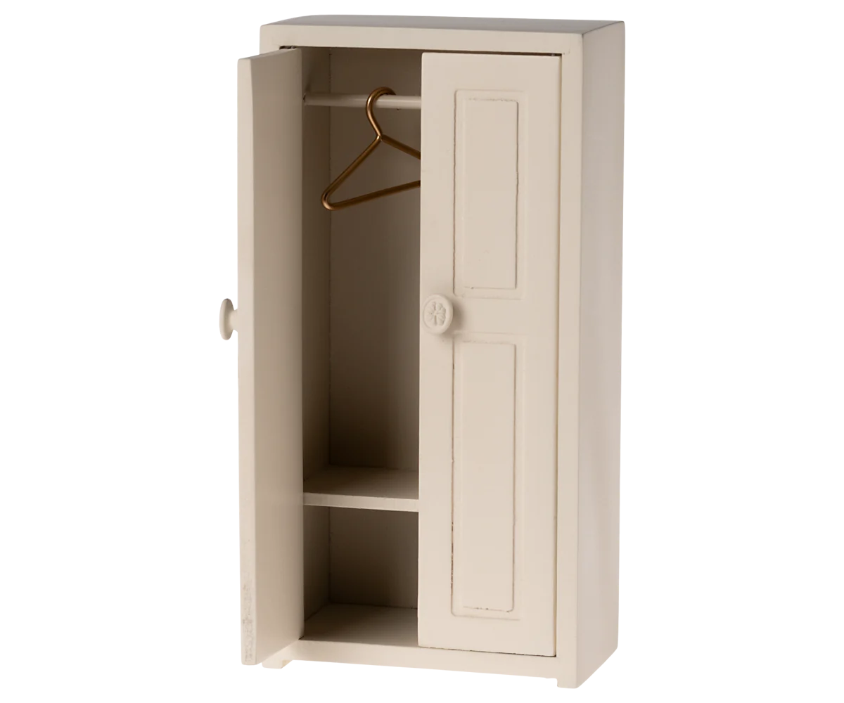 The Maileg Furniture wardrobe by Maileg is a small, off-white wooden piece with one door open, showing two shelves and a metal hanger—ideal for Maileg Mouse dollhouses or miniature room decor.