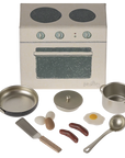 Toy cooking set with stove, pot, pan, utensils, play egg and sausages by Maileg for imaginative play.