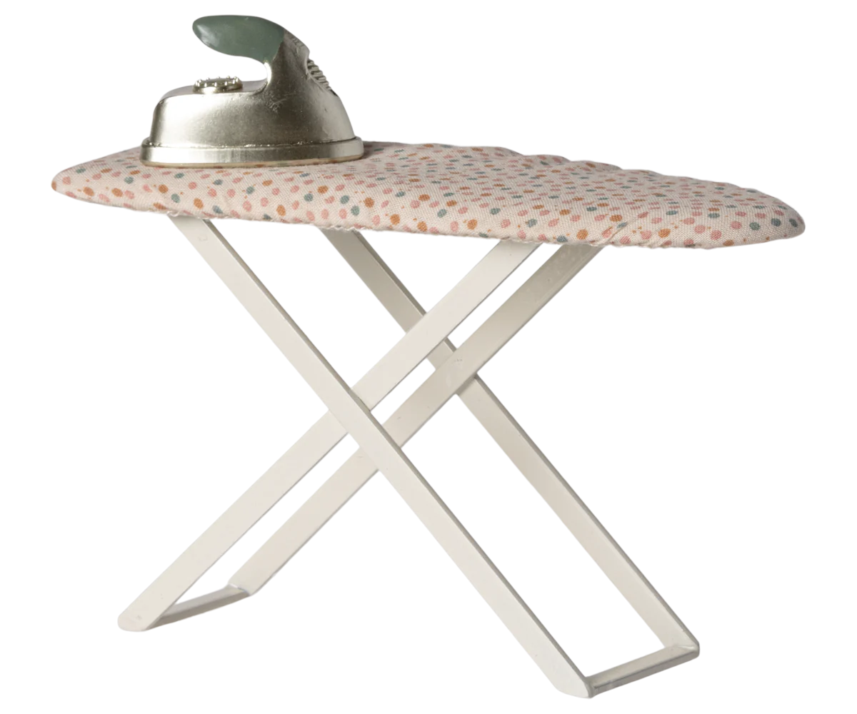 Maileg Furniture by Maileg: This small ironing board with a white frame, patterned cover, and metal iron is a charming addition for your dollhouse or Maileg Mouse setup.