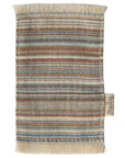 The Maileg Rug by Maileg is a rectangular woven swatch with brown, blue, green, and beige horizontal stripes, fringed edges, and a side tag—perfect as a doll house doormat or for decorating small interior spaces.