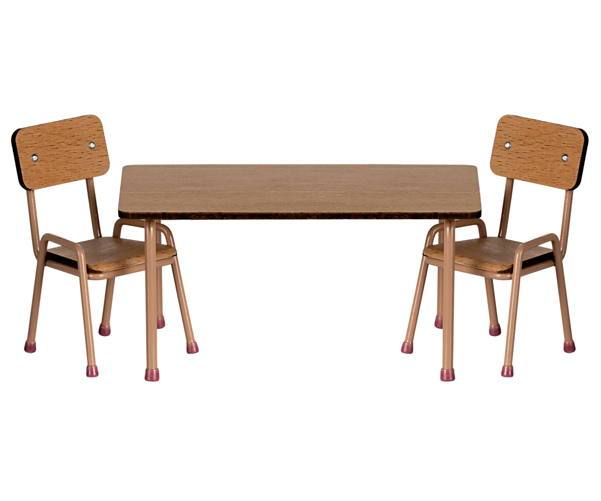 The Maileg Furniture set from Maileg features two wooden chairs with metal legs and a matching rectangular table—an ideal, classic design for dollhouse decor or your charming Maileg Mouse collection.
