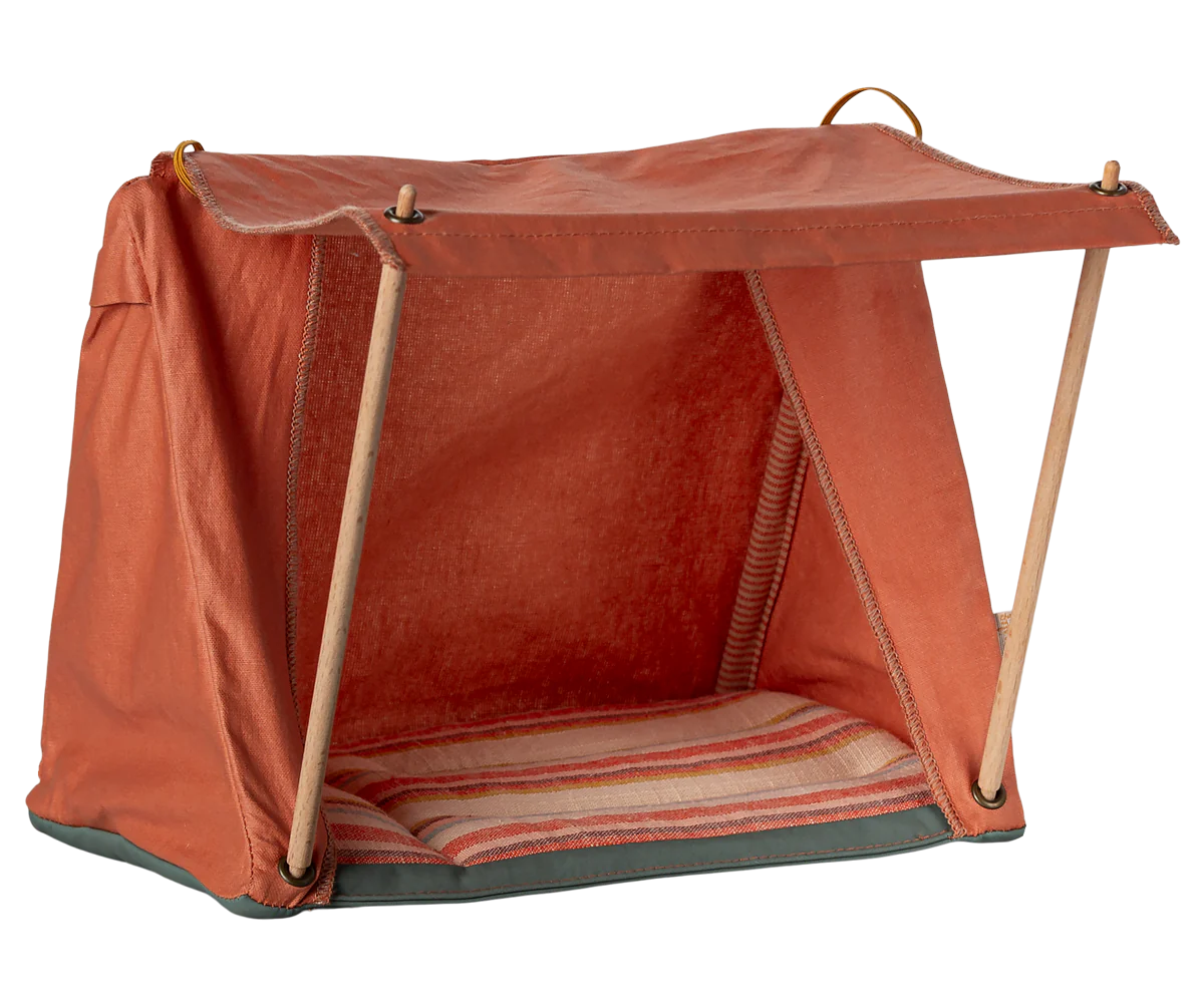 The Maileg Furniture small red fabric tent with wooden poles and striped cushion is an ideal cozy shelter for your tiny friends, perfect as dollhouse décor from the beloved brand Maileg.