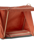 The Maileg Furniture small red fabric tent with wooden poles and striped cushion is an ideal cozy shelter for your tiny friends, perfect as dollhouse décor from the beloved brand Maileg.