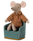A small Maileg stuffed mouse with large ears, dressed in a brown shirt with blue dots and striped shorts, sits upright in a Maileg Folding Chair.