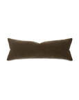 The Trillium Mohar 13X36 pillow by Eastern Accents, featuring a long, rectangular design in brown velvet and a plush pillow insert, is displayed against a white background. The pillow's smooth surface is complemented by slightly tapered ends.