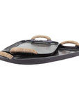 The Import Collection's Chi Chi Tray Small is a black, rectangular decorative tray with rounded edges and jute-wrapped handles, offering a rustic, handcrafted look perfect for transitional style settings.