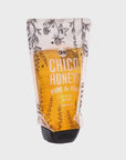 Experience the delightful taste of Faire's Olivarez Chico Honey in a convenient 26-ounce squeeze pouch. The mostly yellow packaging features charming sketches of flowers and plants, capturing the essence of its clover varietal goodness.
