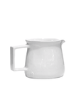 A simple white ceramic Pitcher No. 750 with a square handle and spout, isolated on a white background, perfect for a Scottsdale Arizona bungalow by Montes Doggett.