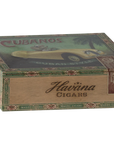 The Maileg Grandma & Grandpa Mice come in a decorative "Haviva Cigars" box with vintage-style artwork, including a yellow car and "CUBANOS CUBAN STYLE," plus ornate green and brown borders—a cozy matchbox bed for these charming Maileg mice.