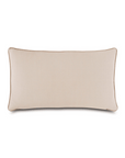 Gira Spot pillow with brown piping detail, displayed against a white background in a Scottsdale bungalow.
