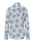 The Waterfall Shirt by Cissa is a long-sleeve, sheer cotton button-up with Trocas shell buttons, shown from the back in white with a blue floral print.