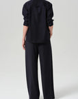 Black button-up shirt with Citizens of Humanity Aurora Portofino Twill pull-on pants, relaxed fit and drawstring waist.