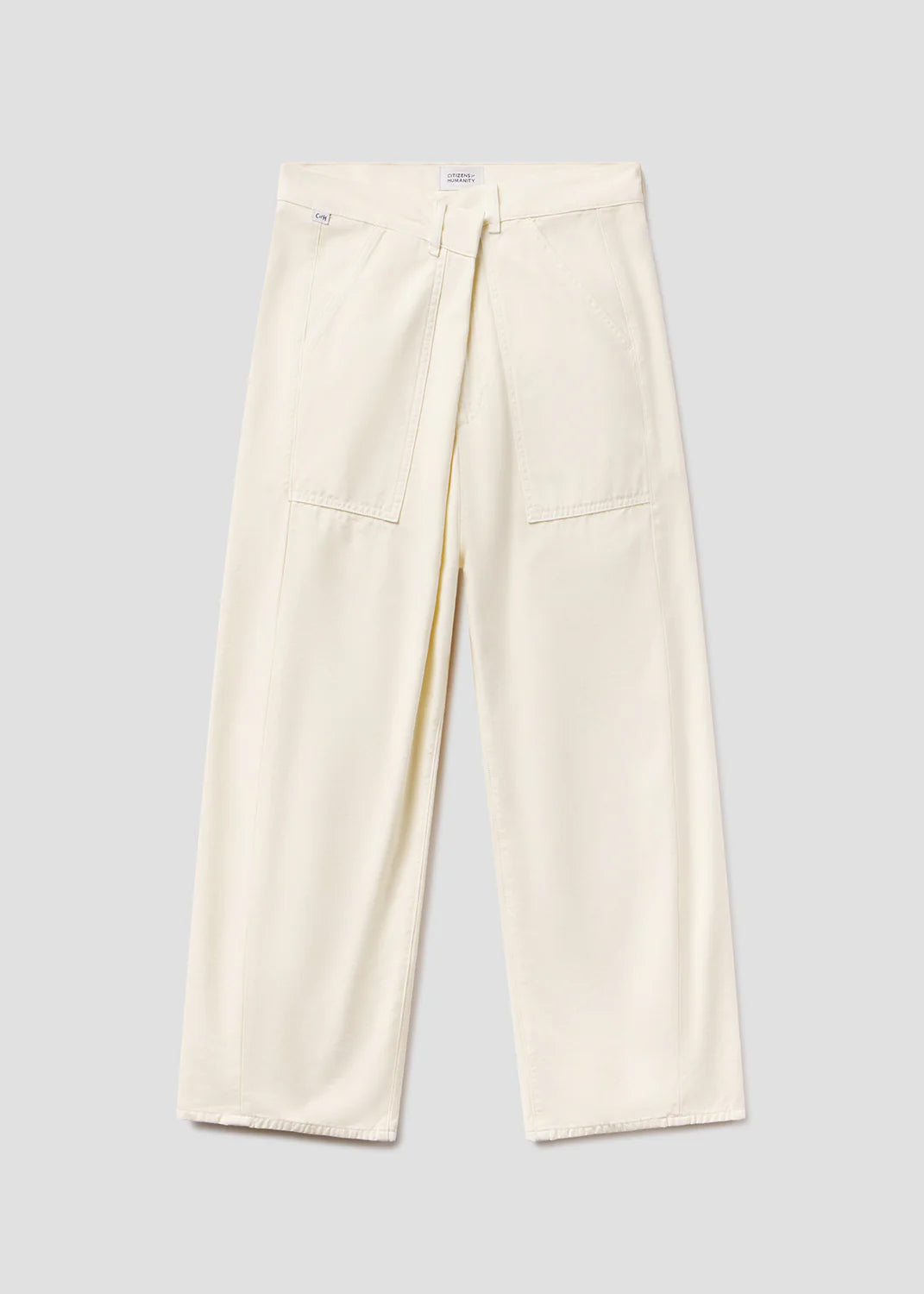 The Ines Crop Utility Trouser by Citizens Of Humanity/AGOLDE features a wide-leg, high-rise cropped silhouette in cream regenerative cotton twill with utility pockets and a relaxed fit, shown laid flat on a light gray background.