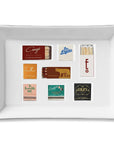 Ceramic tray in Matches LA color by Faire, holding 8 neatly organized matchbooks, perfect for gifting.