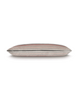 Bungalow-style Chil Striped Pillow with hues of burgundy, cream, and gray, isolated on a white background. The pillow is viewed from the side, emphasizing its thin profile.