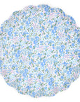 The Faire Mixed Set Reusable Large Plates are round, melamine plates with scalloped edges and a delicate blue, purple, and white floral pattern with green leaves—perfect as decorative party plates.