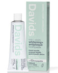 A tube and box of Davids Toothpaste by Faire, made in the USA with a recyclable metal tube, natural mild mint flavor, fluoride-free and sulfate-free hydroxyapatite formula for kids and adults, in white and light green packaging.
