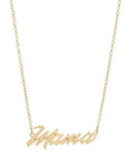 The Faire Script Necklace is a handmade gold chain with a "Mama" cursive pendant, crafted ethically in the USA.