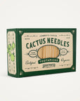 A green and beige box of Faire's "Cactus Needle Toothpicks," showcasing a vintage design with a small cactus illustration, labeled "Cowboy's Choice" and "Certified Organic," contains 1000 hand-picked toothpicks.