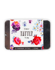 The Tattly Tattoo Tin by Faire is a charming rectangular tin featuring red, purple, and blue floral designs. It contains 10 non-toxic temporary tattoos and 1 sponge, perfect for adding fun to any event.