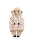 The Sheep Embroidery Kit by Faire is displayed against a plain white background, featuring a plush sheep upright in a detailed cream-colored knitted sweater with charming sheep embroidery.