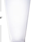 The Creative Co-op Drinking Glass w Debossed Rim features a slightly flared rim, stands 6 inches tall with a 3.5-inch diameter base; each glass is sold individually.