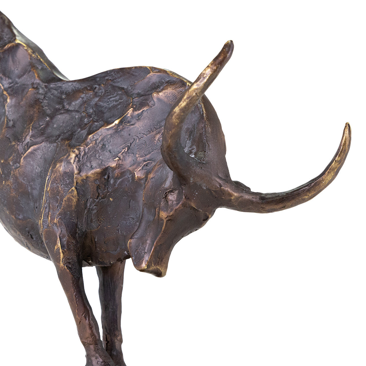 A close-up of The Import Collection’s Bull Statuary highlights its textured bronze finish, lowered head, and curved horns—an eye-catching home decor piece.