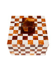 The Import Collection's Camiro Short Box features a brown and white checkerboard design and a matching lid with a raised geometric handle—stylish decorative storage for any space.