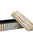 The Daxton Box by The Import Collection is a rectangular box (14L x 6W x 7.5H) with vertical gold, white, and gray stripes. Its hinged lid is partially open to reveal a black interior.