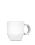 The Montes Doggett Mug No. 925 is a plain white, high-fired ceramic mug with a unique angular handle and clean, modern lines, shown against a white background.