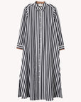 The Xirena Boden Dress is a long-sleeved cotton poplin shirtdress with black and white vertical stripes, a collar, slightly flared hem, and contrasting horizontal striped cuffs.