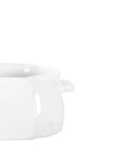 The Montes Doggett S Baker No. 137 is a white, microwave-safe ceramic soup bowl with a small handle on the right, partially shown on the left side against a plain white background.