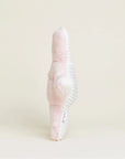 The Faire Starfish Warmies slipper in pastel pink and white stands upright on a light background, highlighting its plush, fuzzy texture and ribbed white sole—crafted for sensory comfort and soothing relaxation.