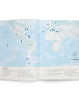 Sailing The Seas V2 by Ingram Book Company shows an open book with a world map and numbered blue dots for sailing destinations. A contents list links numbers to locations, making it ideal for planning global maritime trips.