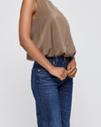 Moussy MV Sculpted Satin Top with scoop neckline styled with blue jeans, hands clasped in front.