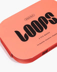 A rectangular, coral-colored box labeled "Hydrogel Eye Mask" by Faire contains 5 masks. The box displays "Weekly Reset" and "For Anytime • Anywhere • Anyplace", perfect for hydrating and refreshing your eyes.