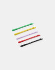 Five CHUNKS Bobby Pins by Faire in green, yellow, red, purple, and black are arranged diagonally on a white background.