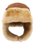 The Faire Shearling Trooper Hat is crafted from real leather with plush tan shearling lining, ear flaps, and a rounded crown, shown from the front against a white background.