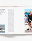 An open copy of CBK: Carolyn Bessette by Hachette Book Group shows a quote and photos of women by the water in casual, timeless beachwear inspired by fashion icon Carolyn Bessette Kennedy.