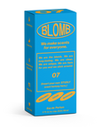 A blue and orange Blomb Eau de Parfum box by Faire says, "We make scents for everyone," featuring notes of bergamot, cedar, mandarin, and skin musk. The number 07 highlights this fresh, inclusive fragrance.
