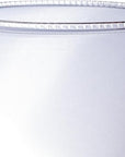 A close-up of Creative Co-op's Drinking Glass w Debossed Rim, featuring a decorative top edge and clear design against a white background. Each glass is sold separately.