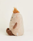The Faire Potato Warmies is a microwavable plush shaped like a smiling beige potato, featuring brown arms and legs plus an orange tuft of hair, shown sitting upright against a plain white background.