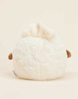 The Dumpling Warmies by Faire is a round, fluffy white microwavable plush toy with small brown wings and a tuft on top. Shown from the back against a beige background, it’s perfect for cozy comfort.