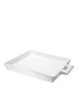 A simple, white ceramic serving tray with a glossy finish and one handle, perfect for a Scottsdale bungalow, isolated on a white background - Montes Doggett Platter No. 454, Large - 1205.