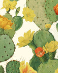 Illustration of green prickly pear cacti with yellow and orange flowers on a light beige background. Perfect decorative touch for botanical-themed parties with Faire Boston Cocktail Napkins.