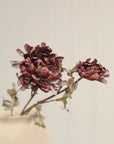 Burgundy Dahlia Spray in vase, by Faire, vibrant artificial floral accent on a light background.