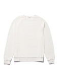 The Kule "The Terry Franny" sweatshirt is a plain, long-sleeve, crew neck cotton-blend top in solid off-white, shown laid flat on a white background. Its design is simple and free from patterns, logos, or embellishments.